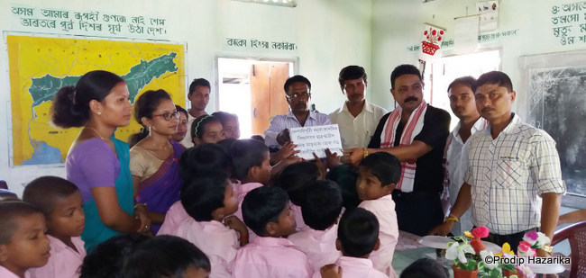 School students of "Nepali Khuti Banuwa Prathamik Bidyalaya" of Bokakhat contributed their one day's Mid-Day Meal for the feeding of Kaziranga Flood rescued rhinos at Centre for Wildlife Rehabilitation and Conservation (CWRC), the joint wildife welfare facility run by Assam Forest Department and IFAW-WTI on Monday,8th August 2016. Photo: Prodip Hazarika