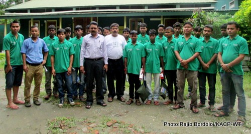 Mr. S K Seal Sarma, Divisional Forest Officer of Kaziranga National Park after handing over of the monitoring kit to the members of Green Corridor Monitors posing for a group photo at a function at CWRC near Kaziranga on Thursday,16th July 2015.Photo:Rajib Bordoloi/KACP-WTI