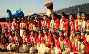 Nyishi women from Seijosa (Arunachal Pradesh) posing for a group photo with the inflatable Hornbill and elephant at the inauguration of Pakke Paga Festival at Pakke on Friday, 16 January 2015. IFAW-WTI is providing elephant, hornbill inflatables along with mobile tiger replica and other collaterals for conservation attraction in Arunachal Pradesh at the three day long Pakke Paga festival which is supported by various conservation NGOs, government agencies socio-cultural groups of Assam and Arunachal Pradesh, headed by Arunachal Pradesh Forest department. Photo: Subhamoy Bhattacharjee/IFAW-WTI