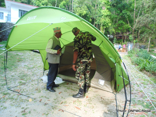 Tikaram Adhikari,DG, Department of National Parks and Wildlife Conservation, Nepal inspecting the tents provided by IFAW-WTI and WLT in Kathmandu, Nepal before shifeted to high altitude field posts.Photo: DNPWC,Nepal